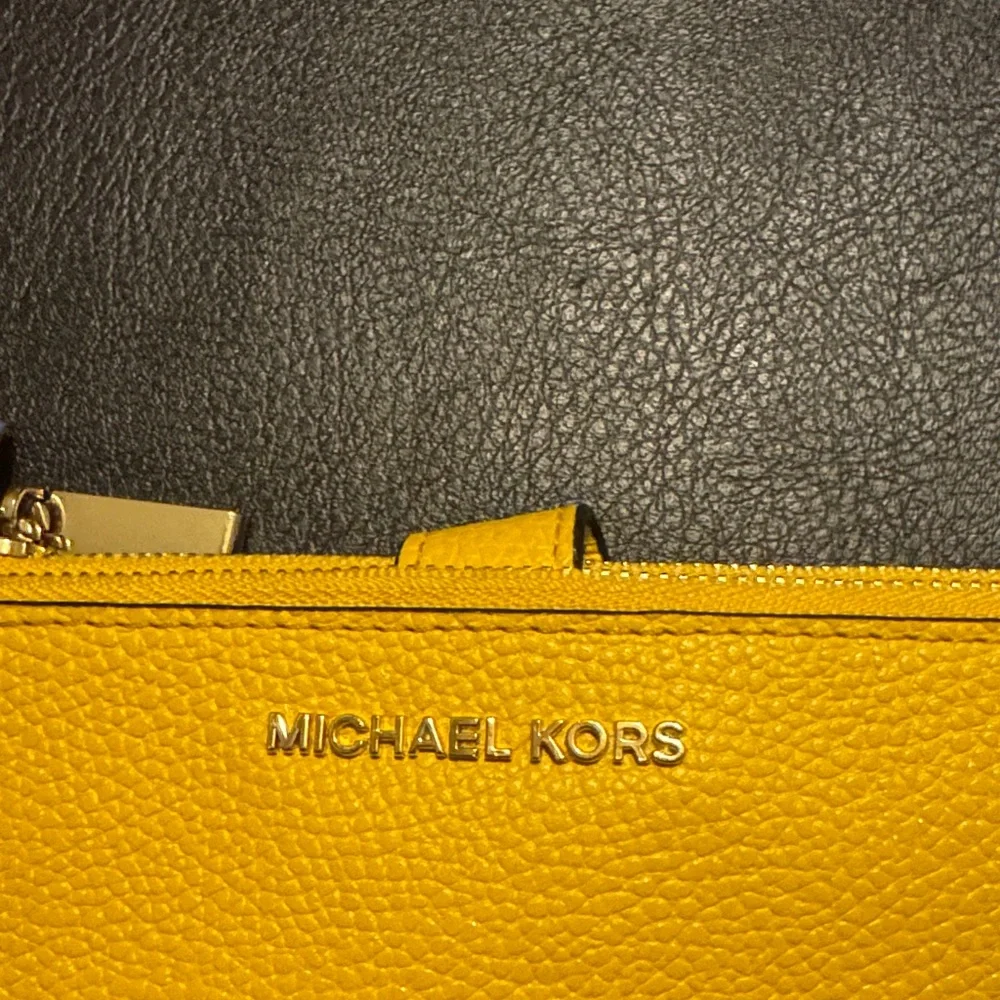 Michael Kors Mustard Yellow Wristlet In Great Used Condition With One Small Mark - Picture 2 of 10